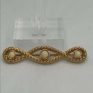 Monet Gold Infinity Brooch with Cream Accents